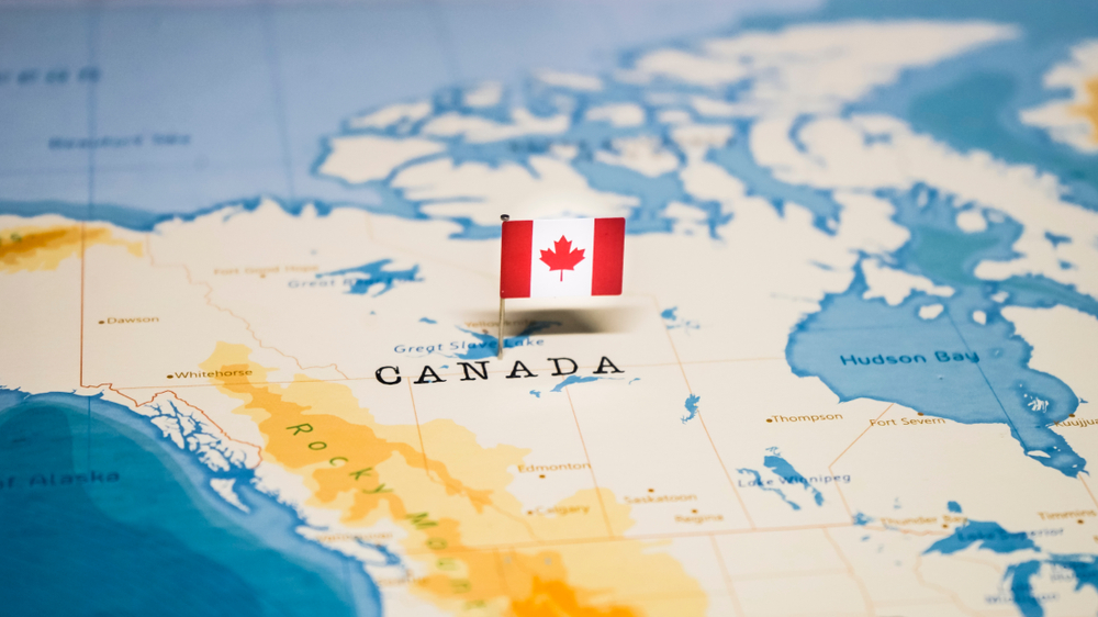 The,Flag,Of,Canada,In,The,World,Map